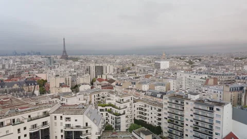 Wide static view of Paris cityscape and Eiffel Tower on cloudy day Stock Footage 290881913