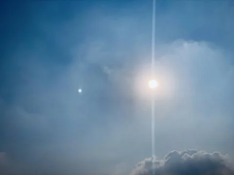 Wide Static View of Sun in Hazy Sky Over Jakarta Indonesia Stock Photos