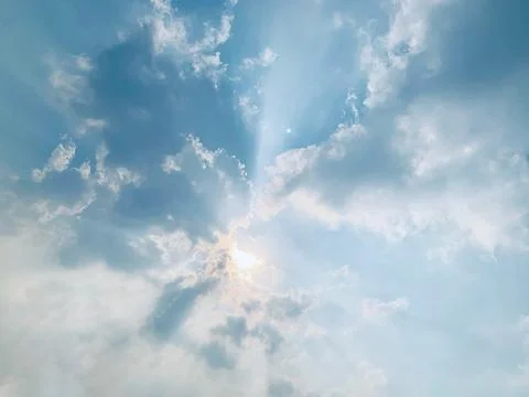 Wide Static View of Sun Rays and Clouds Over Jakarta Indonesia Stock Photos