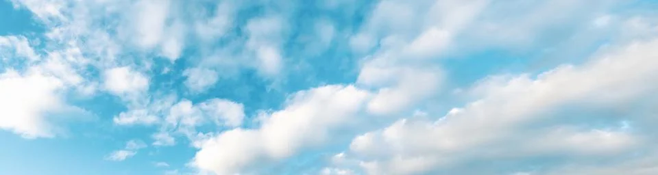 Wide summer cloudscape, partially cloudy blue skylight, fluffy clouds Stock Photos