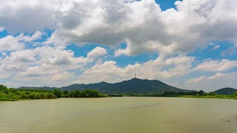 Wide Summer River Under Blue Sky And White Clouds Timelapse Stock Footage 320508574