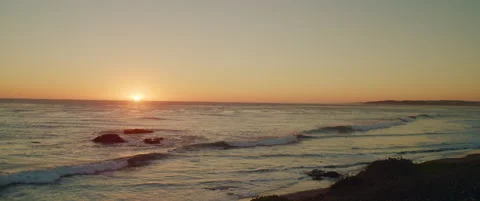 Wide of sunset with waves in San Simeon Video stock 136449032