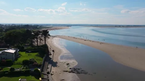 Wide Sutton Sand Spit with Shallow Tidal Channel and Beachgoers Stock Footage 338067987