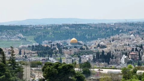 Wide telephoto landscape view of Jerusalem Old City featuring the Dome of the Stock Footage 341508043
