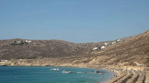 Wide tilt down shot of the popular elia beach on mykonos, greece Stock Footage 69871985