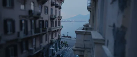 Wide tilt-shift dawn between buildings in Naples Italy Stock Footage 136397782