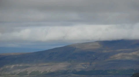 Wide time-lapse of clouds over hills and mountains in Iceland Stock Footage 30377293