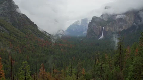 Wide time lapse of storm blowing in Yosemite Valley Stock Footage 62626011