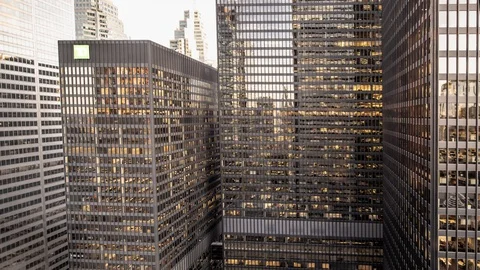 Wide timelapse of skyscraper windows at sunset. Stock Footage 116909134