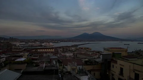 Wide timelapse of the sun seting over the Naples harbor with Mount Vesuvius Stock-Footage 239468253