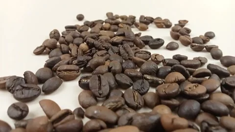 Wide trail of roasted coffee beans with forward camera movement Stock Footage 336388086