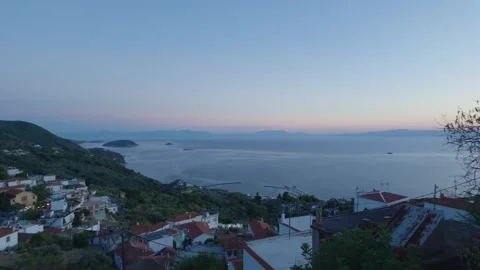 Wide twilight view overlooking the traditional village of Glossa on Skopelos Stock Footage 346665117