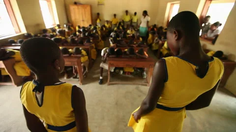 WIDE: TWO STUDENTS LEAD A CLASSROOM IN A SONG Stock Footage 59735452