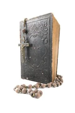 Wide vertical studio shot of very old, vintage Holy Bible with lots of ornaments Stock Photos
