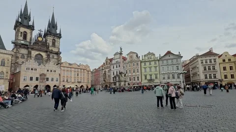Wide view across Prague Old Town Square showing historic Baroque and Gothic Stock Footage 342342182