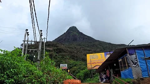 Wide view of Adam’s Peak in Sri Lanka on a rainy day. 4K Stock Footage 332619859