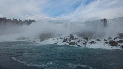 Wide view of American Falls, Luna Island and the rock talus below Stock Footage 345996066