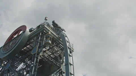 Wide view of the Baron 1898 dive coaster in the Efteling amusement park driving Vídeos de archivo 338071853