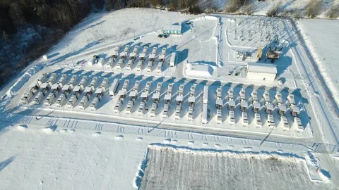 Wide View Battery Storage Park and Substation in Snow Kiisa Estonia Energy Grid Video stock 329528053