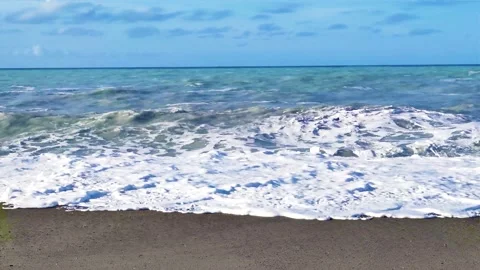 Wide View of the Blue Ocean Falling on the Beach. South Sea Waves Hit the Shore. Stock Footage 232673856