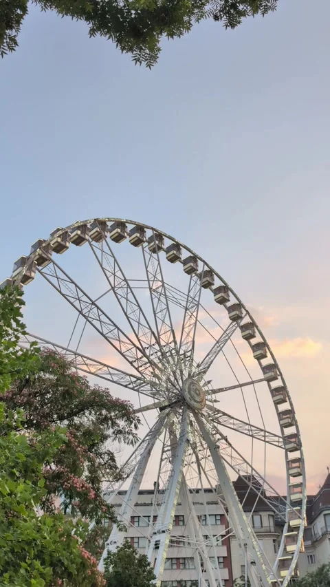 Wide view of the Budapest Ferris Wheel at golden hour Stock Footage 340554735