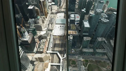 Wide view from CN Tower of train entering Union Station Stock Footage 192039415