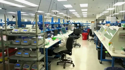 Wide view of a crime laboratory testing DNA samples from criminal cases Stock Footage 345363660