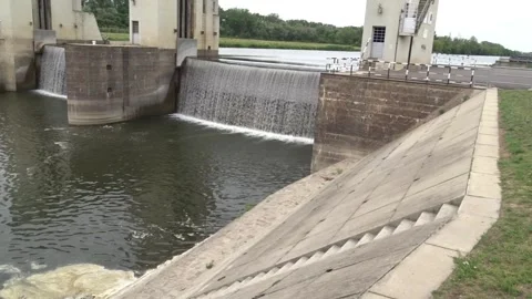Wide view of dam structure with high and low water Stock Footage 336204137