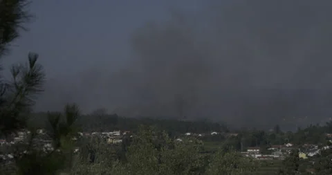 Wide view of the dark smoke from the Forest Fire in Ourem municipality, Portugal Stock Footage 204742775