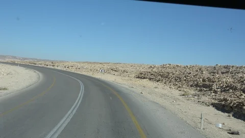 Wide view of desert road through the Isreal southwest. Stock-Footage 97823904