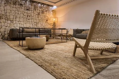 Wide view of an empty rustic hotel reading room in low season. Tourism concep Stock Photos