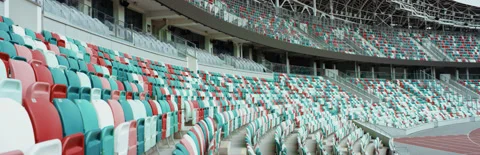 WIDE View of empty stadium seats before game or during Coronavirus pandemic Stock Footage 135304331