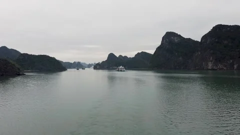 Wide view of Ha Long Bay with limestone islands and boats Vietnam Stock Footage 335279889