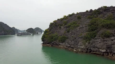 Wide view of Ha Long Bay with limestone islands and boats Vietnam Stock Footage 335279957
