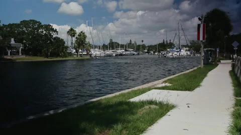 Wide View Horizontal looking back into Gulfport, Florida marina. Small boat head Stock Footage 285269351