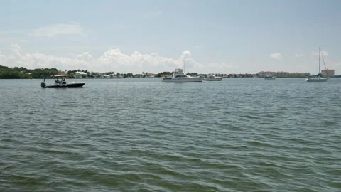 Wide View Horizontal looking out from outlet to Boca Ciega Bay Gulfport, Florida Stock Footage 285265944