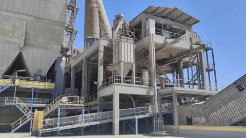 Wide View of Industrial Concrete Structure and Raw Mill in Cement Factory 動画素材 333343959