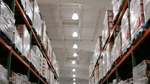 Wide view of inside a Costco Wholesale warehouse store with tall shelving 스톡 동영상 344029226