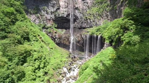 Wide View of Kegon Falls Surrounded by Lush Green Forest in Nikko Japan Stock Footage 345096205