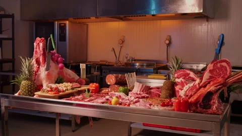 Wide view layout of various sausages and raw meat chunks. Stock Footage 295270189