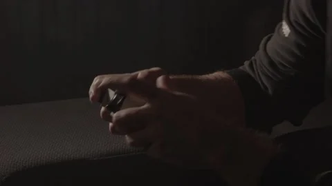 Wide view of man playing videogame controller and throwing it on the Stock Footage 221756854