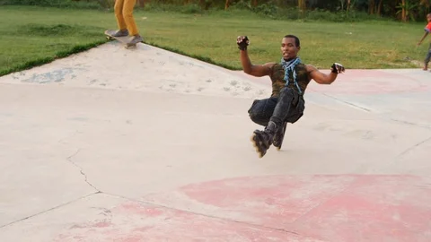 Wide view of a man riding roller skate in slow motion. Stock-Footage 110892768