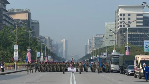 Wide view of marching contingent and vehicles at National Day parade in Stock-Footage 346350219