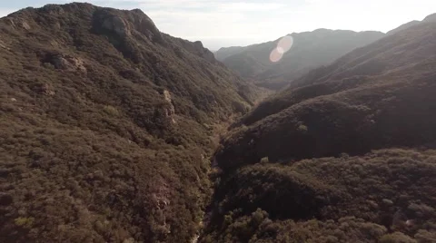 A wide view of the mountains. Flying over Maliby Hills. Stock Footage 49878504