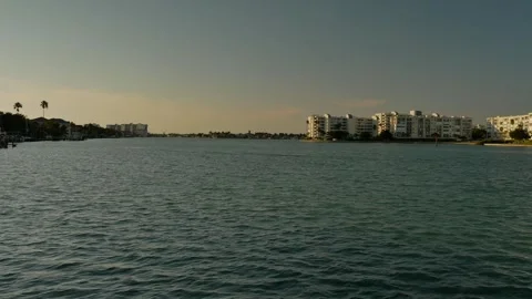 Wide View north from St Pete Beach Community Center towards far shore buildings Stock Footage 272655746