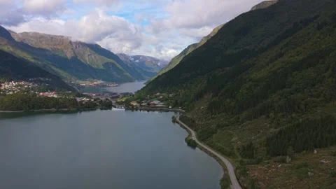 Wide view of Odda village set in rugged west coast of Norway Stock Footage 320245449