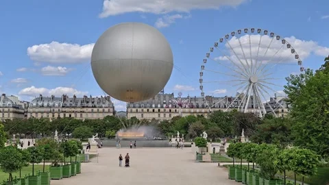 Wide View Of The Olympic Cauldron And Ferris Wheel Over The Grand Walkway In Stock Footage 343043992