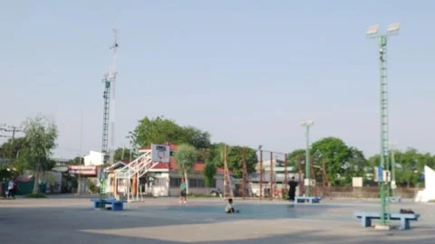 Wide view of an open public outdoor basketball and sports court Stock-Footage 331706032