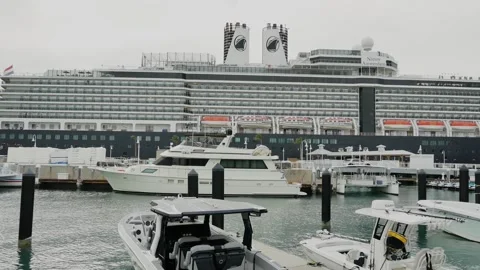 Wide view over a boat dock Port of call for Holland America Cruise Line ship. Si Stock Footage 300805568