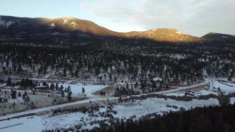 Wide view over mountain town in Colorado Rockies Stock Footage 261590041